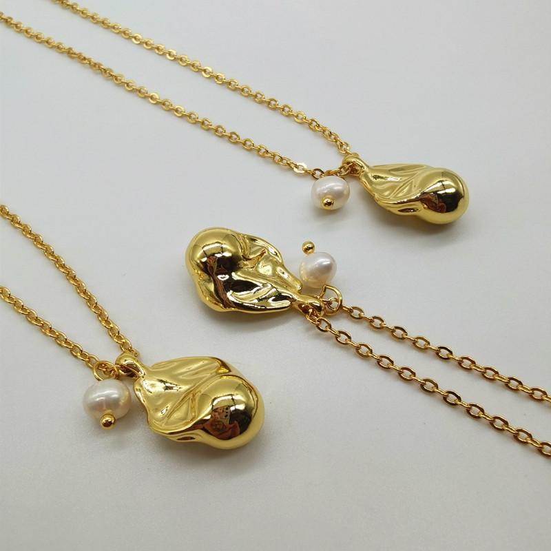 Meier Gold-plated brass faux freshwater pearl pendant necklace - elegant, minimalist, and versatile