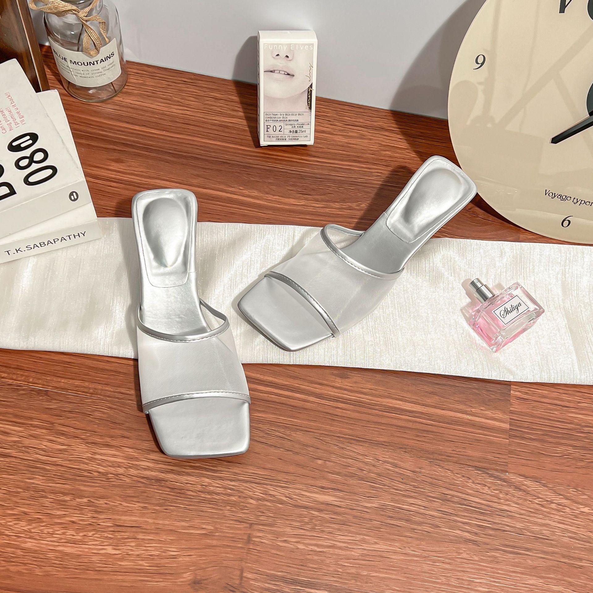 

Summer new high-heeled cool slippers girl 2025 wear high-end fairy wind breathable word with mesh sandals woman 35