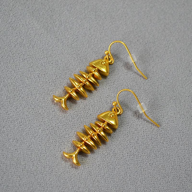 

Retro Gold-Plated Fishbone Earrings: European & American Vintage Design