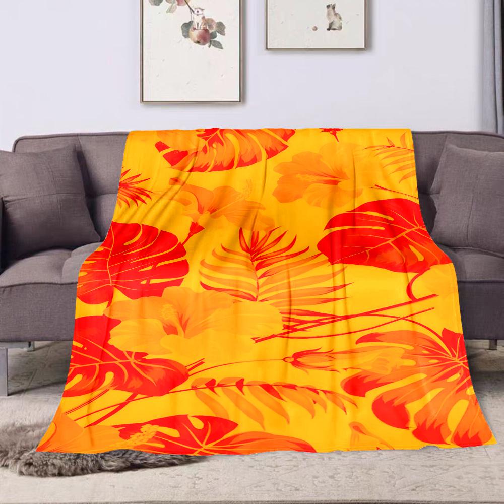 Tropical Floral Orange and Red Design Patterned flannel blanket perfect for the bedroom living room, sofa, or a little nap