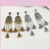 Ethnic Inspired Long Drop Earrings With Bell Tassels And Flower Motif For Ladies