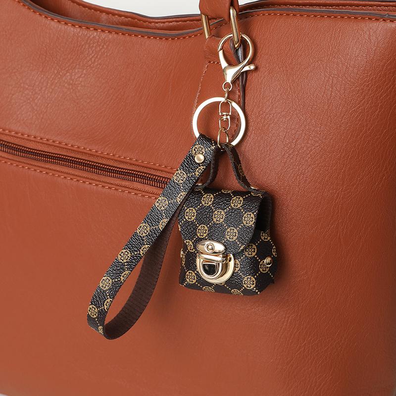 

Портативный мини-брелок, светлый, роскошный, из искусственной кожи, сумка для наушников, подвеска, многофункциональный мини-чехол для хранения, брелок коричневый