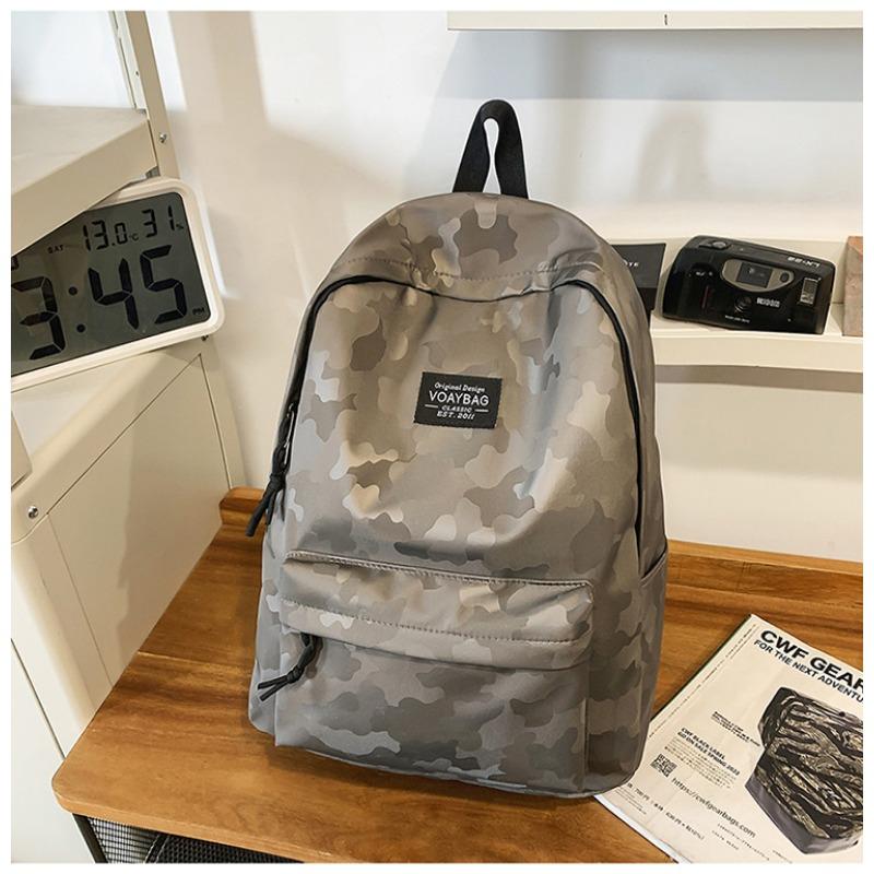 Simple and Versatile Backpack On Campus  High School Students' Large Capacity Leisure  Light Shoulders for Men and Women.