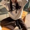 Autumn and winter new versatile design bow knitted sweater women's loose soft waxy round neck pullover