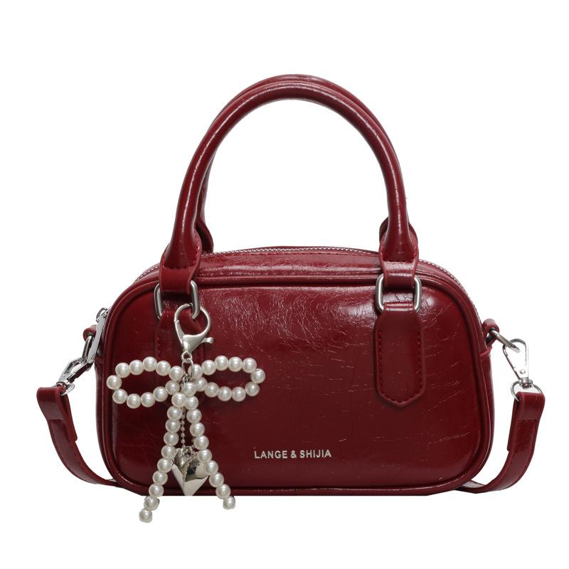 

Бордовая маленькая сумка женская 2025 лето новая кожа с масляной восковой пропиткой портативная сумка-подушка универсальная текстура ретро сумка-мессенджер бордовый