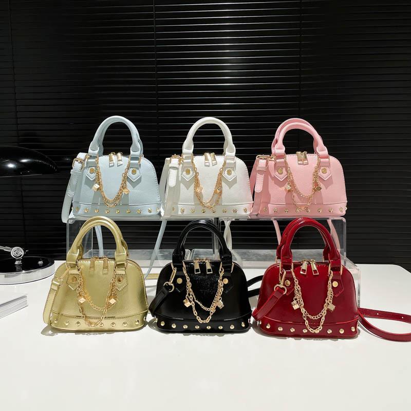 Women Bags Women's Bags 2025 New Korean Version of Fashion Niche Portable Personalized Rivets Messenger Shell Bag