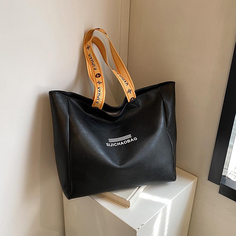 

Большая сумка, иностранный стиль, модная атмосфера, досуг, высокое чувство, большая вместительная сумка, переносная студенческая сумка через плечо прилив