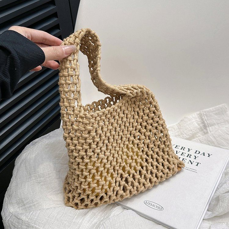 Ausgehöhlte Netzbeutel Handtasche Handgewebte Baumwollseil Tasche Handgelenktasche Strandurlaub Eimertasche