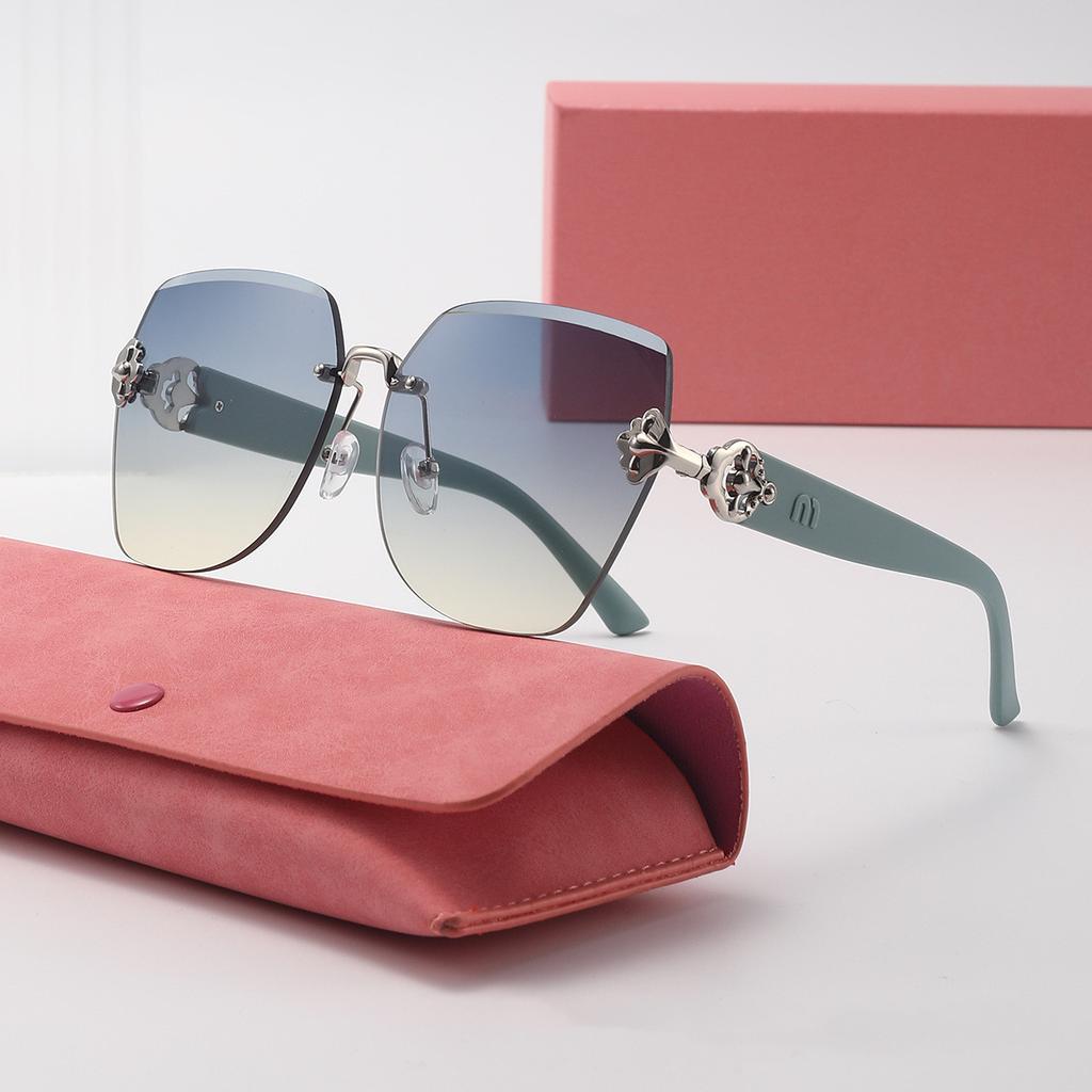 new large frame light luxury frameless fashionable sunglasses for women UV protection small sunglasses(DS-2402)