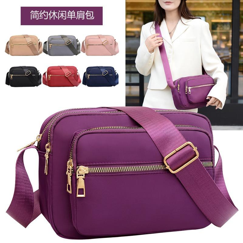 New Oxford cloth bag women's bag lightweight anti-splashing shoulder messenger bag mother bag mobile phone change cashier bag