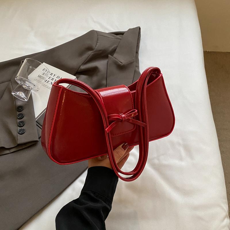 

Premium bow handbag niche underarm bag 2025 new temperament commuter versatile shoulder bag women бордовий