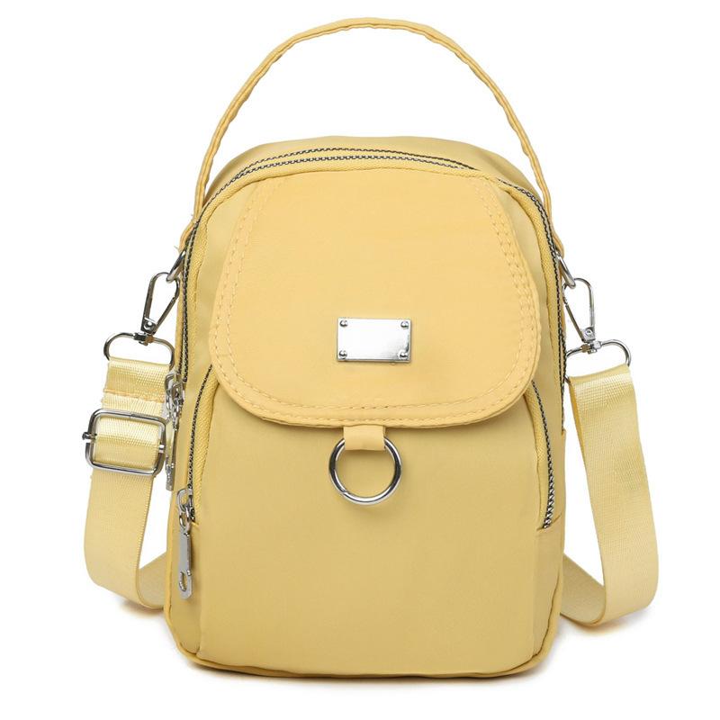 Bolso bandolera ligero de nailon para mujer: minibolso informal con múltiples compartimentos con cremallera y correa de hombro extraíble. Disponible en una docena de colores.