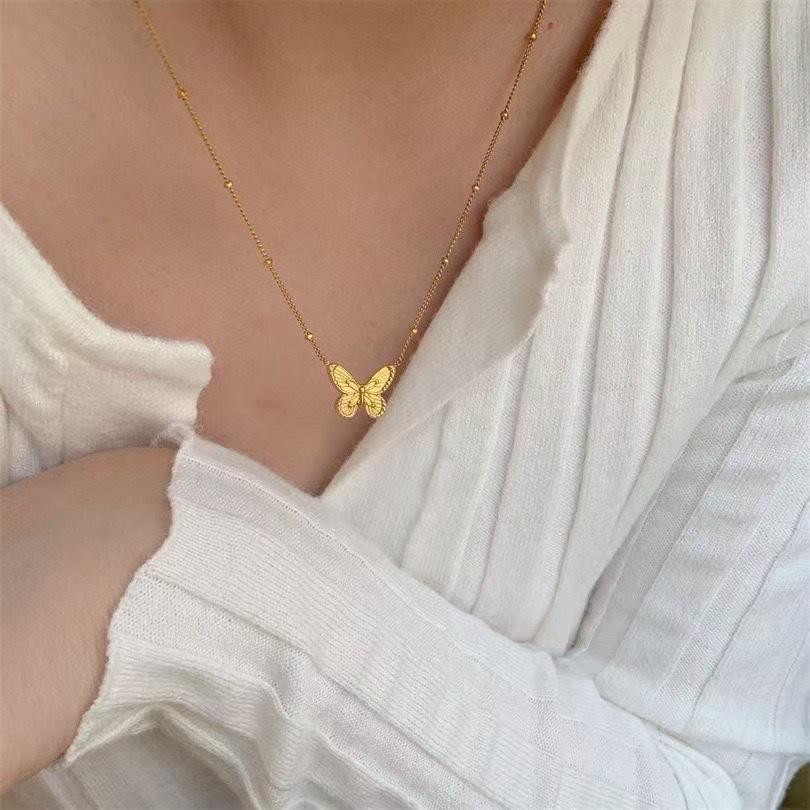 Collier papillon minimaliste français, design idyllique esthétique féminin, tempérament haut de gamme, bijoux simples de niche