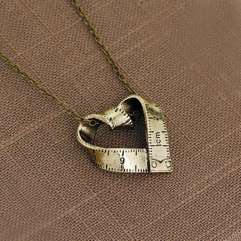 Heart shaped tape measure pendant, accessory, European and American accessories, versatile creative retro pendant