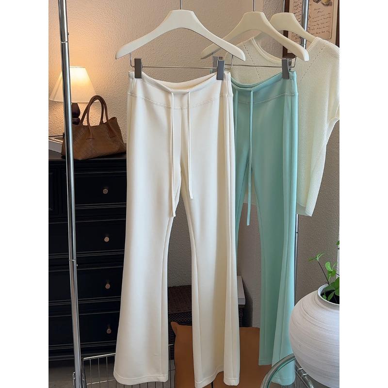 

Mudal micro-pull pants women s casual soft waxy simple drawstring trousers summer new slim-fitting and thin solid-color sweatpants M абрикосовый