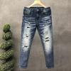 Spring and Autumn new ripped jeans men's elastic slim-fitting small feet trendy brand ruffian handsome point paint trendy fashion pants