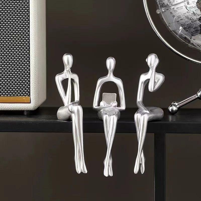 Luxuriöses abstraktes kreatives sitzendes Figurenornament für TV-Schrank oder Bücherregal