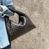 Woven shoulder bag underarm bag spring and summer new bag women's bag handmade high-texture dumpling bag tide