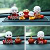 Creative Little Monk Maitreya Buddha Car Ornament: Cute, Shaking Head Resin Doll for Car Interior Decoration and Safety.