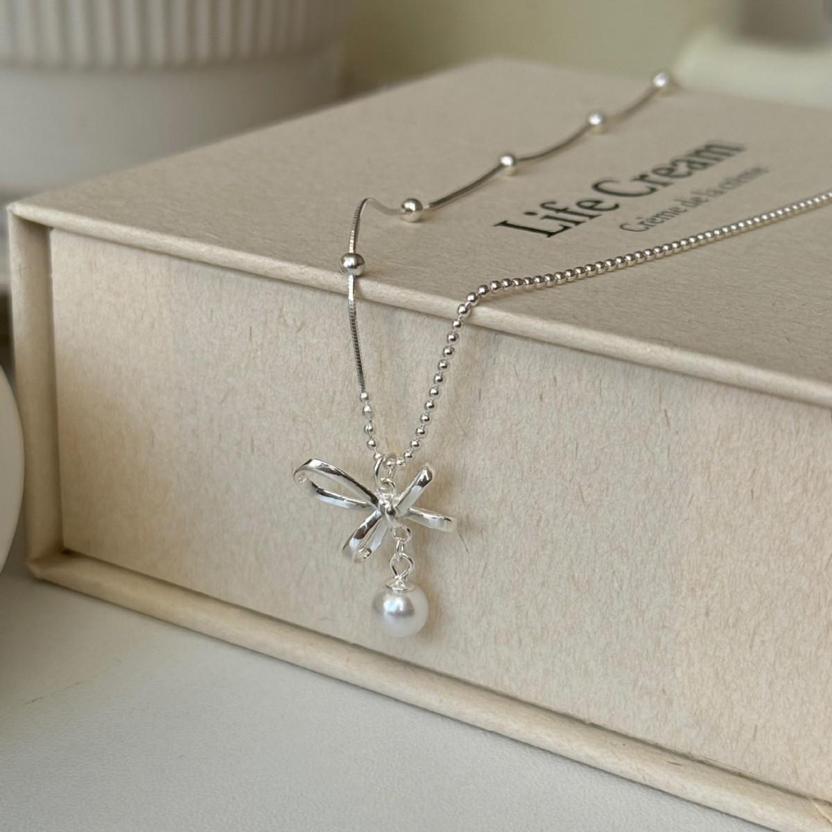Asymmetrical Bow Pendant Necklace: Versatile Fashion Layered Chain for Women