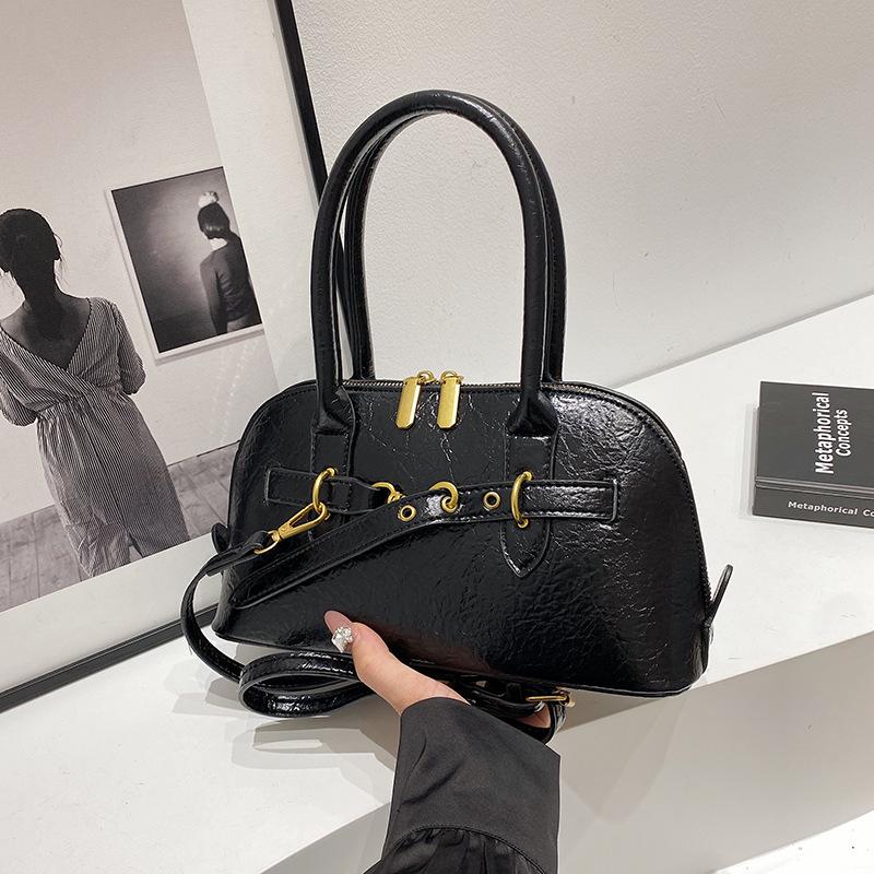 

Популярная нишевая портативная сумка-ракушка для женщин 2024 года, осень-зима, новая ретро-сумка высокого класса, универсальная ручная сумка