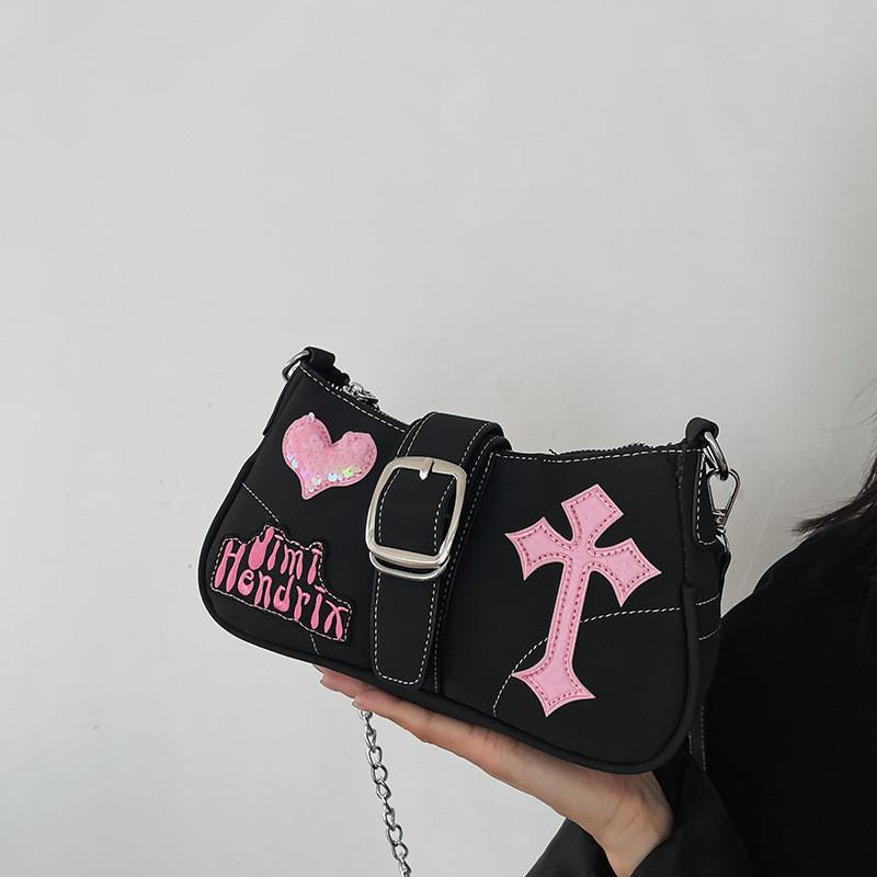 

Stylish Black Crossbody Bag For Women Featuring Unique Chain Details And Chic Design