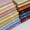 Litchi-patterned PU Leather Fabric Soft Material Matte Lychee Patterned for Jacket Clothing Designer Diy Sewing Wholesale Cloth