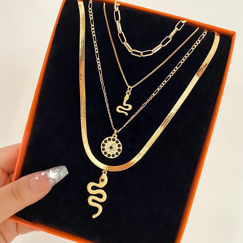 Four Piece Snake Necklace Women's Fashion Hollow Out Necklace Personality Bohemian Sweater Chain Elegant Snake Pendant