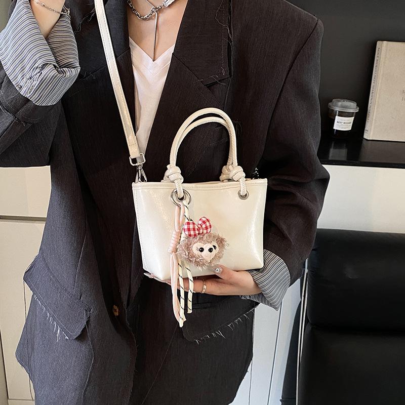 Korean fashionable spring and summer foreign gas oil wax leather portable bucket bag versatile gentle wind temperament advanced sense messenger women