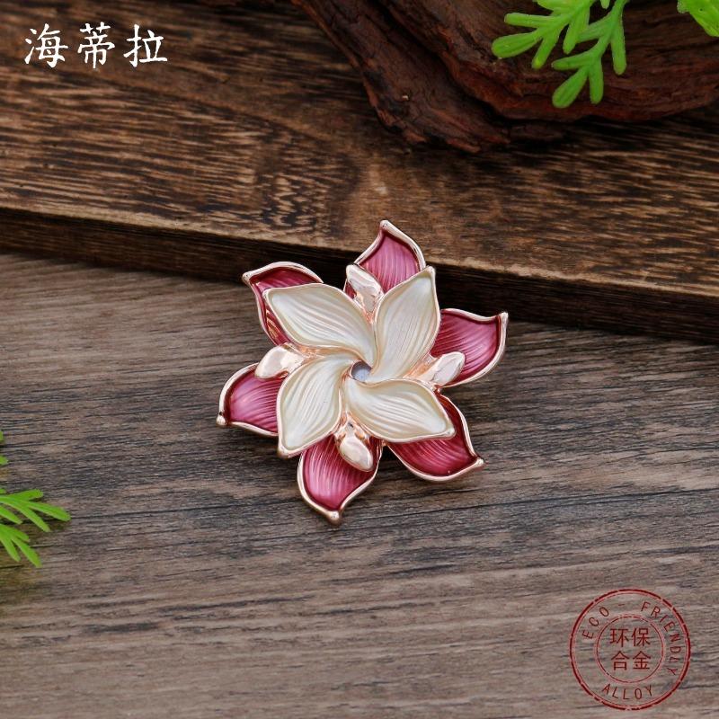New enamel color hollow geometric camellia magnetic brooch women's fashion versatile three-dimensional flower corsage