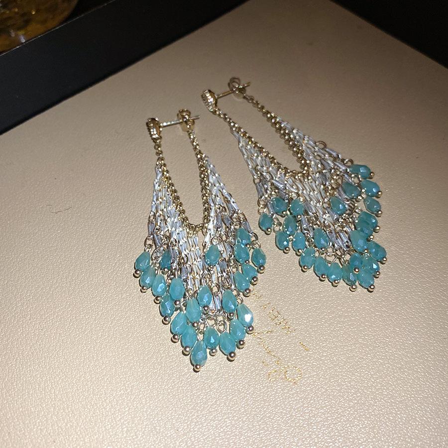 

Silver needle glass water drop fringed earrings European and American exaggerated fashion personalized earrings light luxury niche high-end earrings