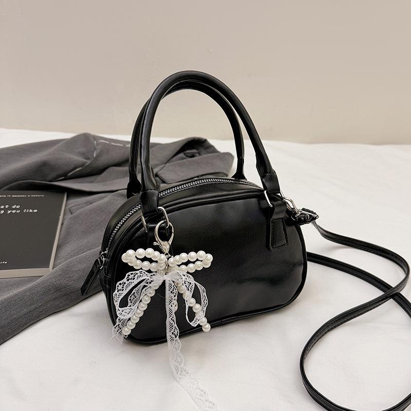 Neue Nischendesign modische Textur Handtasche Bowlingtasche Damen vielseitige Schulter Umhängetasche