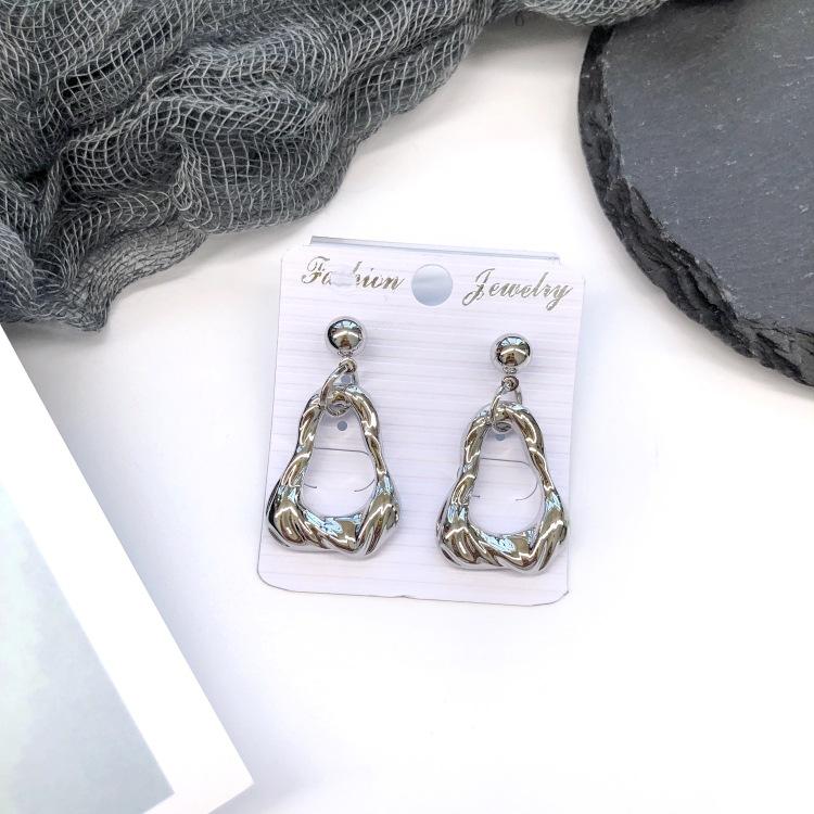 Retro stil personlighet överdrivna metallnitar örhängen enkla geometriska barockstil hoppande örhängen mode öron smycken