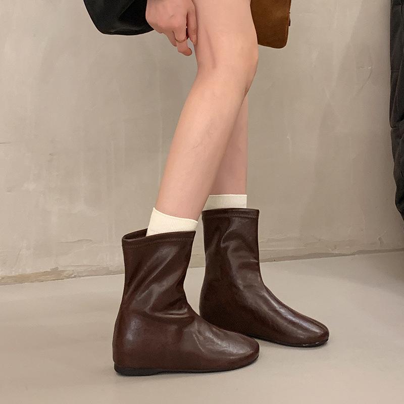 Medium leather boots flat bottom round head elastic winter new super soft thin boots inner height increase high boots look thin