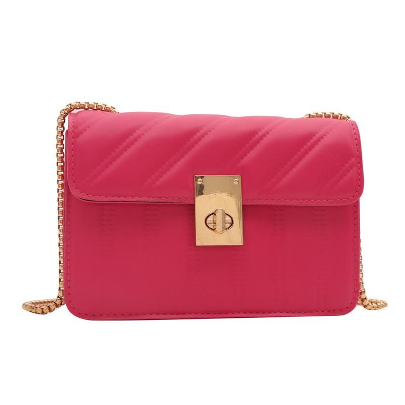 

Korean version of personalized versatile chain bag, women s texture lock oblique span bag 2024 new shoulder armpit bag троянди рожеві кольору