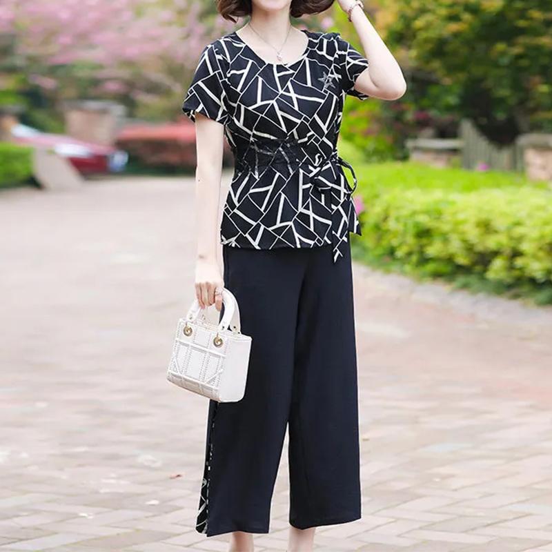 

Элегантные модные костюмы с принтованными поясами и брюками, летние новинки для отпуска, футболка с коротким рукавом и круглым вырезом, длинные брюки, свободные женские XXL чёрный