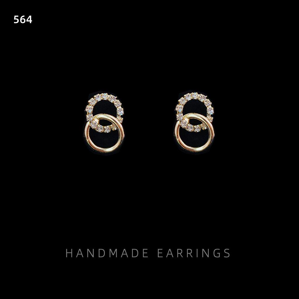 Bright eyes needle plated real gold double C cross Korean version Korean hipster earrings copper diamond earrings