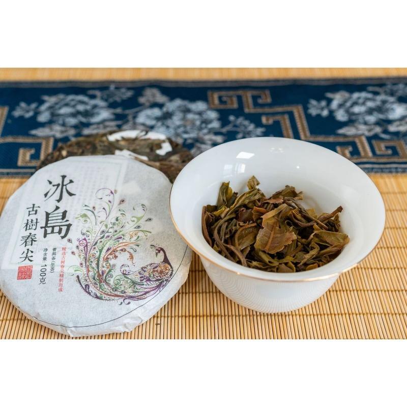 100g Pu'er Raw Tea Iceland Yunnan Ancient Tea Spring Tea Cake Orchid Fragrance