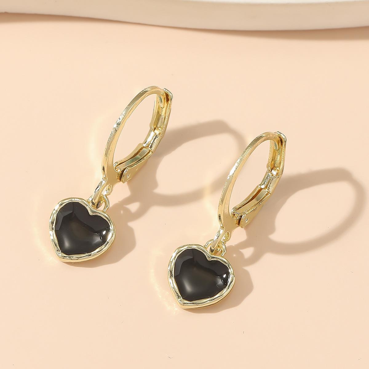 Eco-friendly Korean Heart Pendant Earrings - Stylish High-end Alloy Design Ear Cuffs