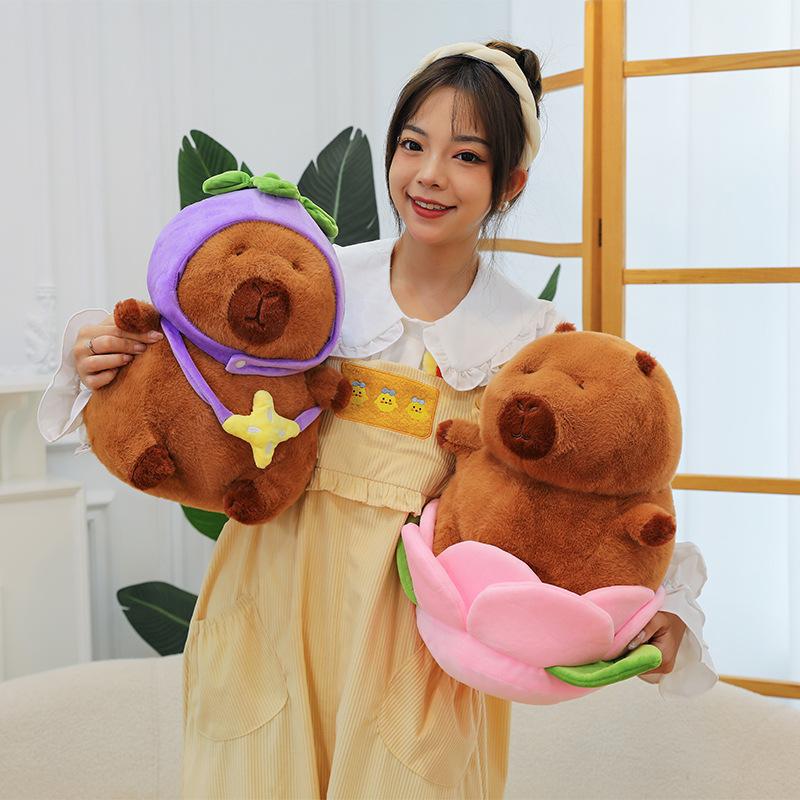 New lotus eggplant hat backpack capybara doll ugly cute kapibara dolphin boy plush toy grab machine
