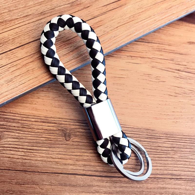 

Creative hand-woven double ring PU leather rope keychain metal car key ring accessories pendant opp bag packaging
