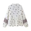 A New Spring Women's Fashion and Casual Long-sleeved Shirt with A Round Neck and Printed Necklaces