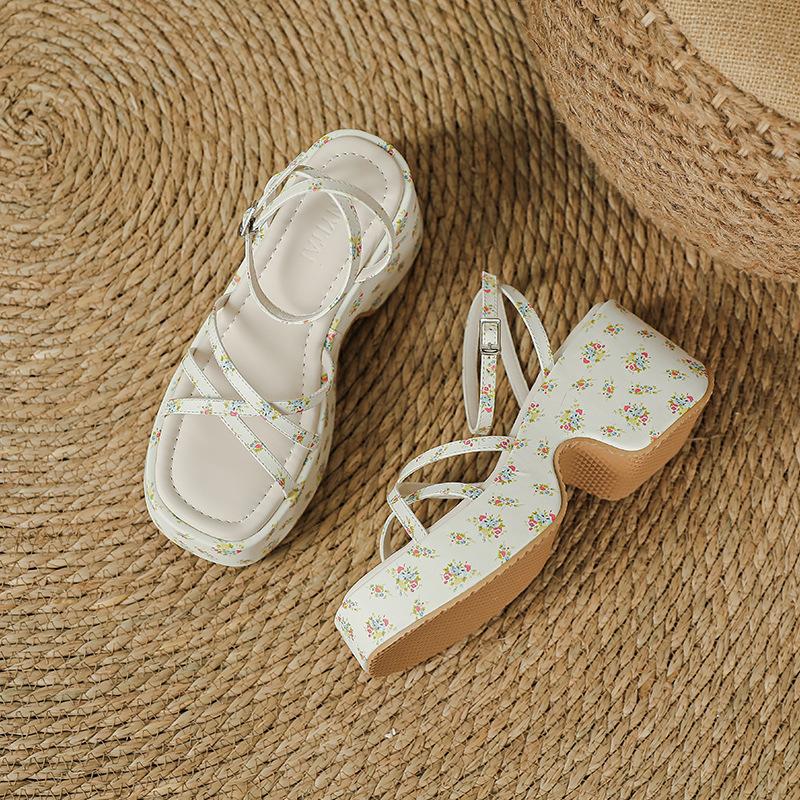 Sweet and cool wind thick-soled wedge sandals women's height increase 7cm muffin waterproof table one-word buckle belt summer new Roman shoes