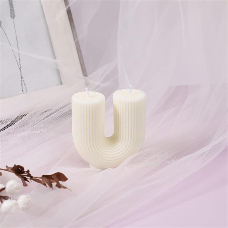 U-Shaped Geometric Striped Scented Candle for Modern Birthday and Home Decor Scene Layout