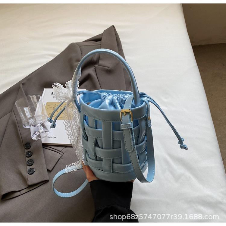 2025 Spring and Summer New Woven Niche Hand Basket Fashionable Versatile Single Shoulder Crossbody Premium Sense Commuter Bucket Bag