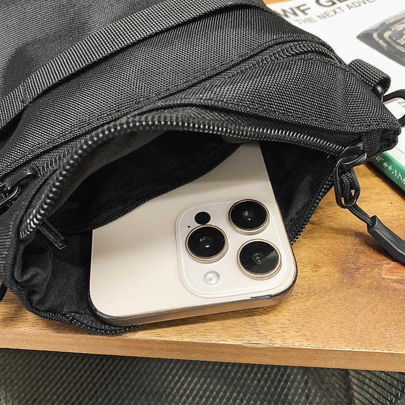 Korean casual trend messenger bag women's summer fashion sports portable Oxford cloth mobile phone bag versatile