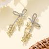 Elegant Zircon Bow Tassel Earrings – High-End Slimming Design
