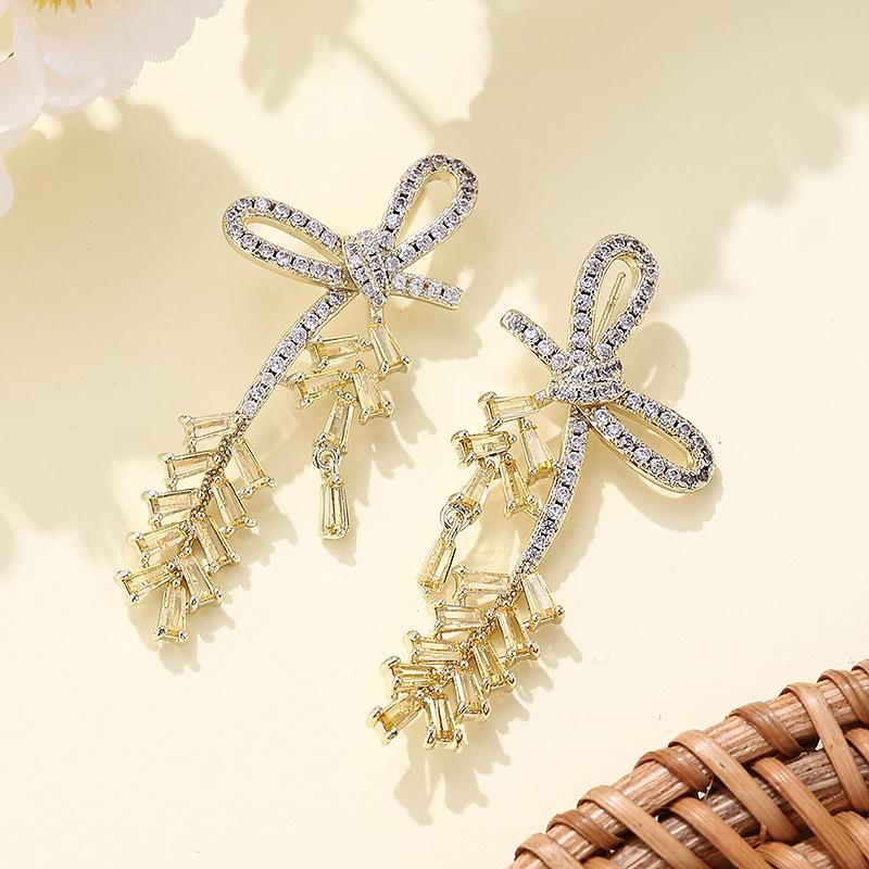 Elegant Zircon Bow Tassel Earrings – High-End Slimming Design