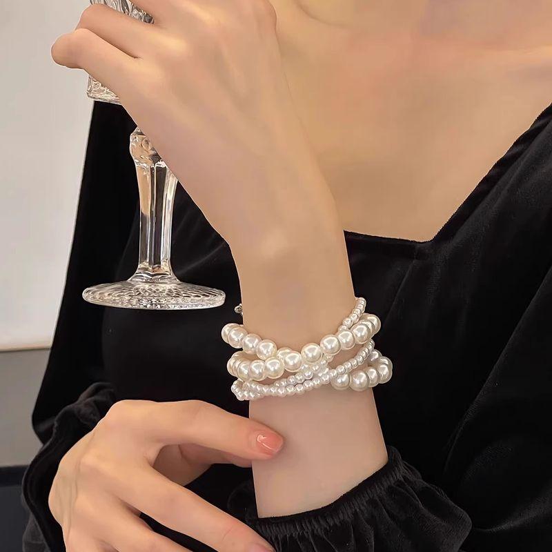 

Интернет-знаменитость Барочный жемчуг Многослойный двойной браслет Женский Особый интерес Легкая роскошь Причудливый браслет из бисера со стразами Ручные украшения White 4-Layer Wrap Bracelet