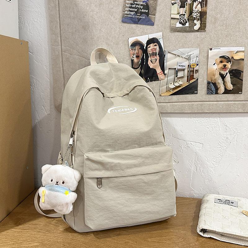 College style schoolbag for girls Junior high school students Simple large-capacity computer backpack Casual high school students Travel backpack tide